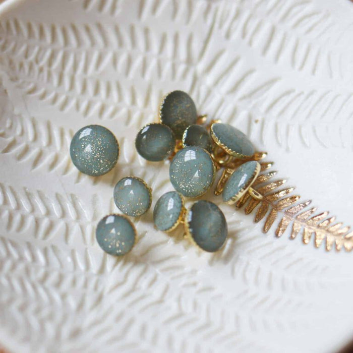 Golden glitter shank buttons